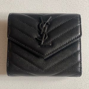 SAINT LAURENT
Monogramme quilted textured-leather wallet